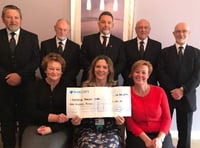 Funeral directors donate £300 to cancer support through Tree of Remembrance