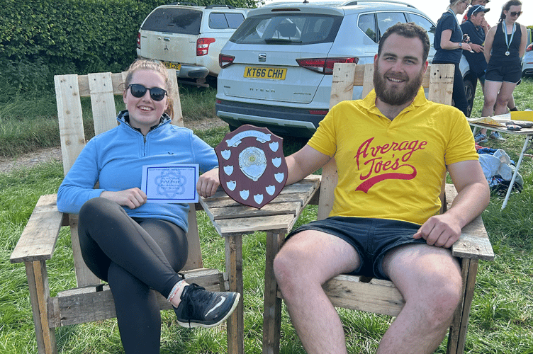 Pallet Recycling Champions Sophie Pratt and Michael Hayball from Withleigh YFC pictured in the companion chair they created.