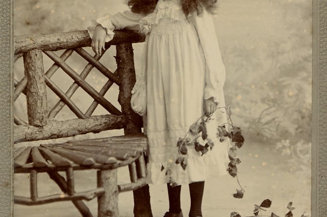 c1880's studio photo of Miss FF Luscombe whose father taught woodwork at Kingsbridge Grammar School [KGS] in the 1930's. 