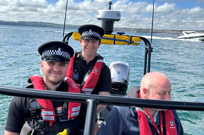 Officers take to the water off the shores of Devon