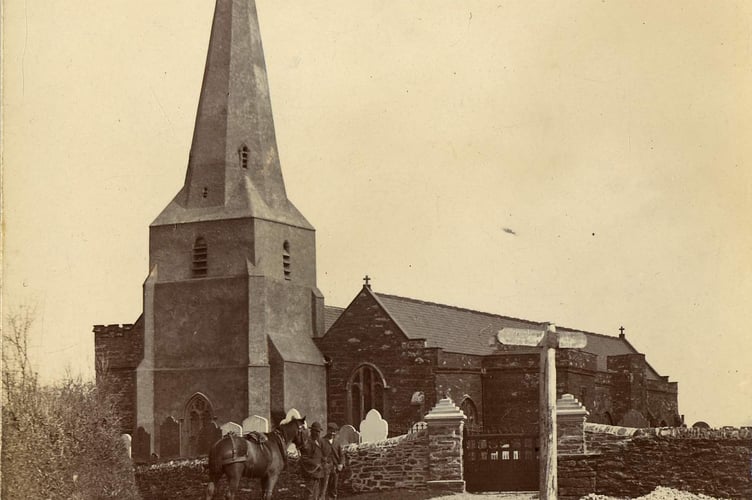 Malborough Church, two men with a horse by the wall.