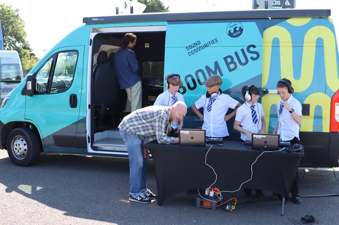 Students broadcast from the Boom Bus