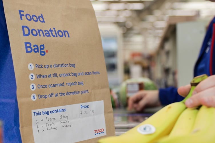 Shoppers in Tesco are being asked to round their bill up to the nearest pound this summer to help the food bank campaign