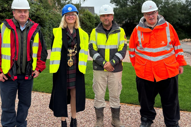 From left: Paul Barnes CAMC Head of Estates, Cllr Emily Price, Mayor of Totnes, Nick Gower Site Foreman Barratt and Canniford and Wayne Brown Regional Manager CAMC.