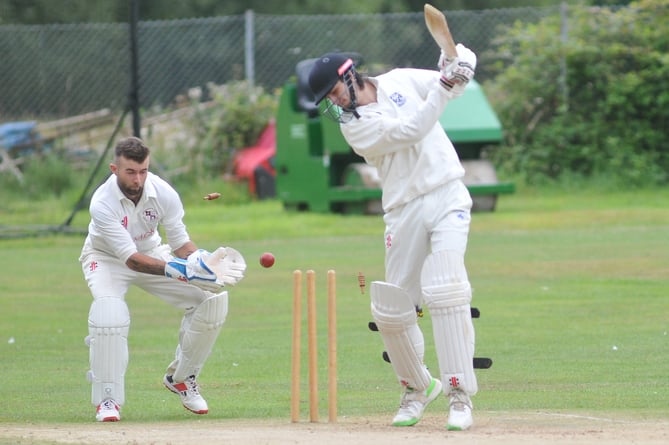 Devon Cricket League D Division West.  Kenn versus Dartington and Totnes. Kenn's Alex Cox says farewell to his bails