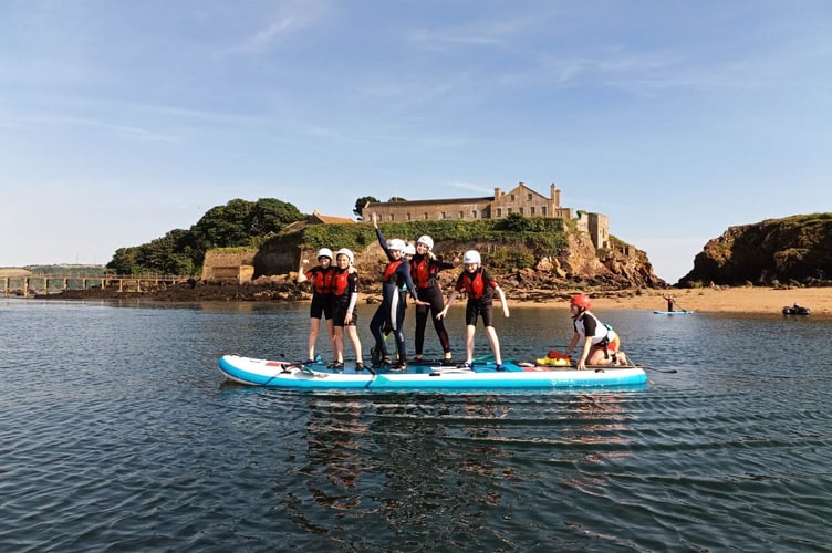 Take to the sea and go stand-up paddleboarding. Picture: South West SUP