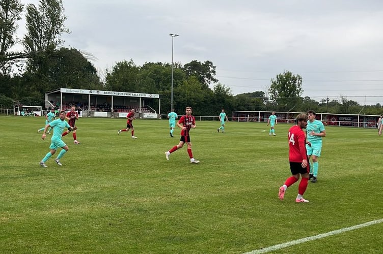 Action from Ivybridge Town's win away at Brislington FC