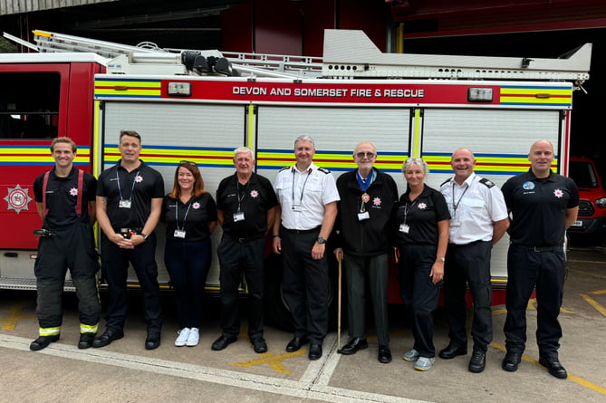 Chief fire officer Gavin Ellis, centre, with, fourth right, Cllr Simon Coles, chair of the Devon and Somerset Fire and Rescue Authority with some of the event organisers and firefighters at the event.  AQ 2016
