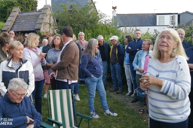 Locals gather in the Church Garden to celebrate the inaugural peal