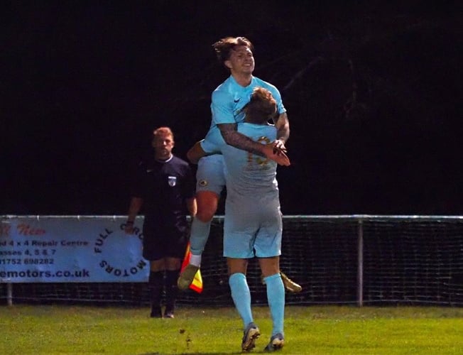 Ivybridge Town celebrate one of their two goals against St. Austell