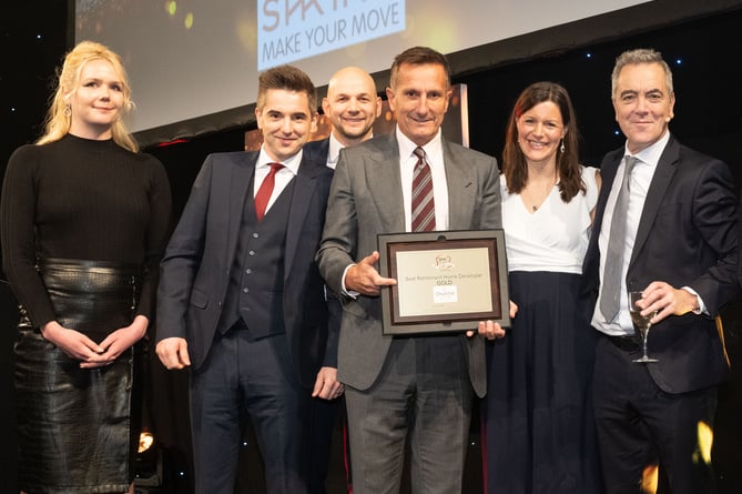 Churchill Living Colleagues celebrate GOLD WhatHouse Award 2024 - presented by James Nesbitt (far right)