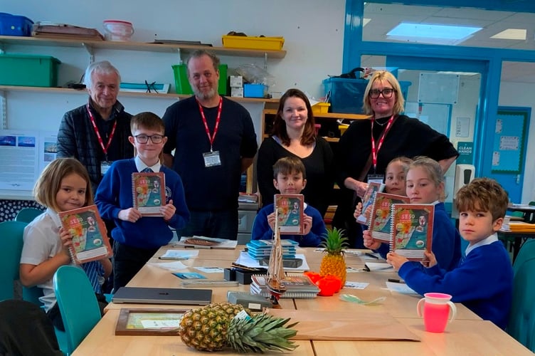 L to R: Roger Barrett, Chair of Salcombe Maritime Museum, Simon Roberts, the book’s designer, Chrissy Milton, Museum Education Officer and Caroline Flage, Museum Engagement Officer with some children