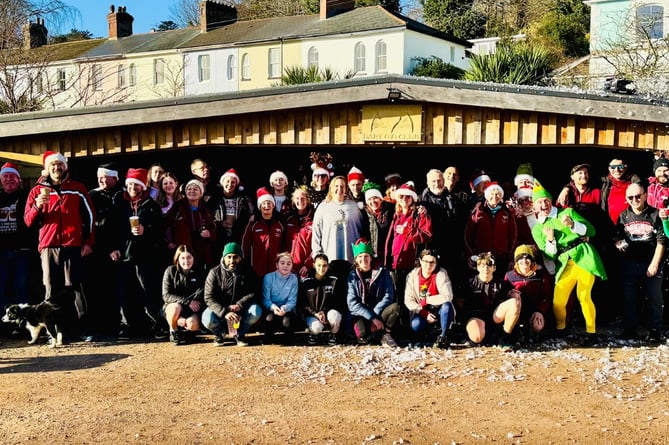 Dart Gig Club rowers celebrating their annual Christmas row